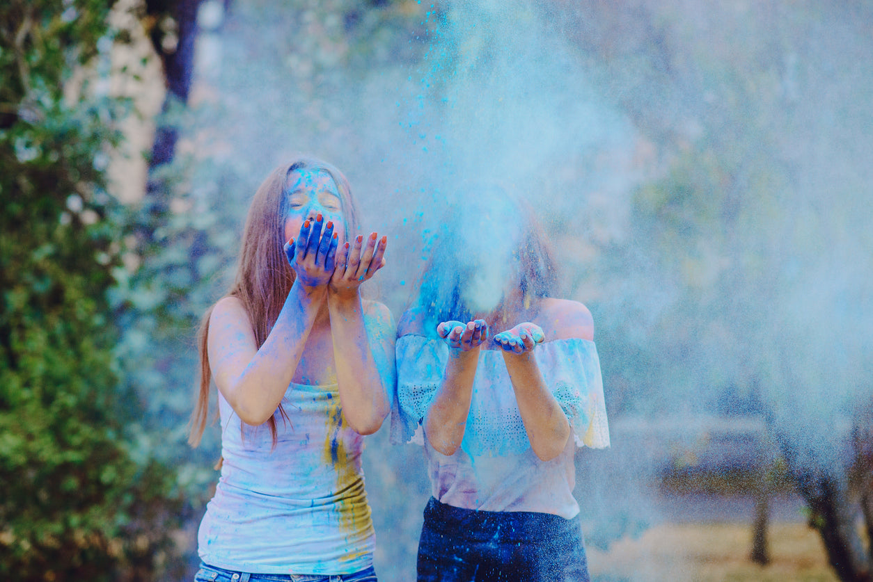 Color powder cloud captured in motion during an event